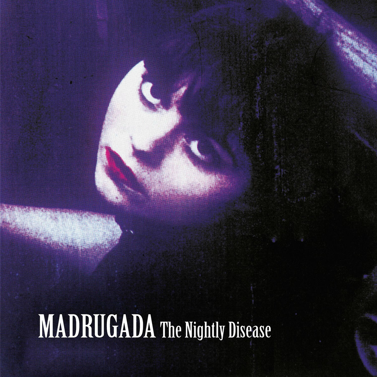Album cover for The Nightly Disease by Madrugada